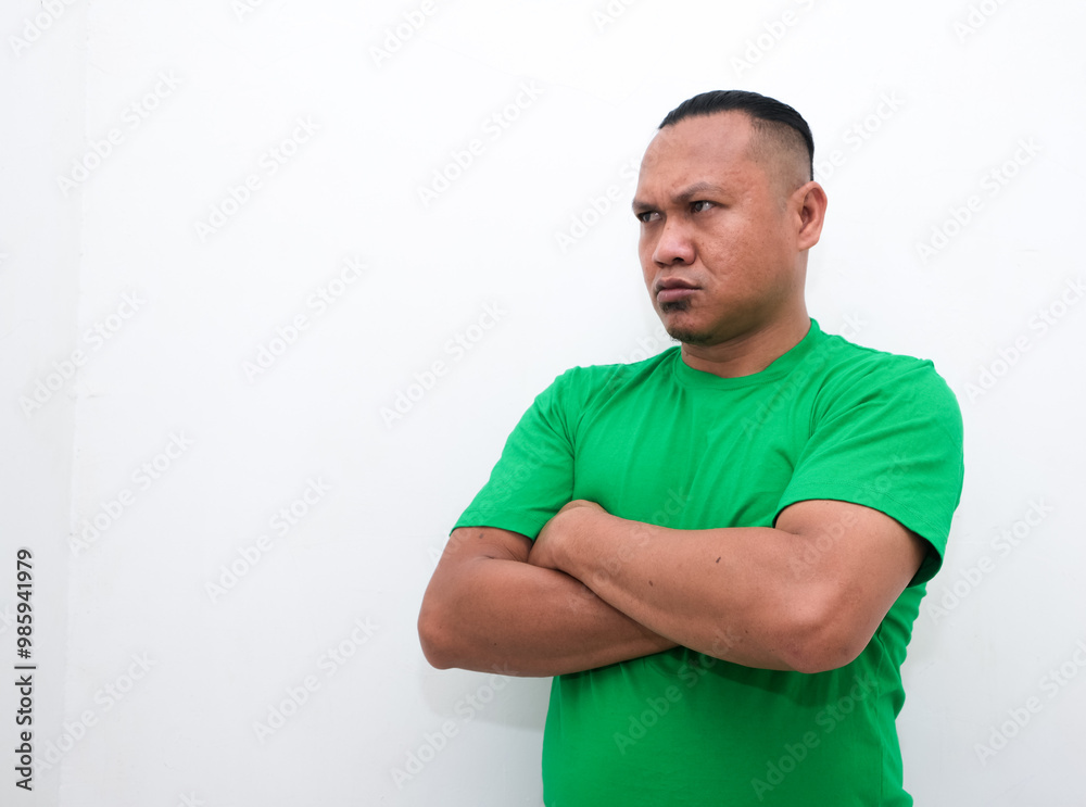 Portrait of an angry Asian man on white isolated backgrund Portrait of an angry Asian man on white isolated backgrund