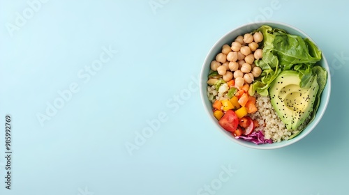 Wallpaper Mural Healthy Buddha Bowl with Chickpeas,Avocado and Quinoa on Pastel Blue Background Torontodigital.ca