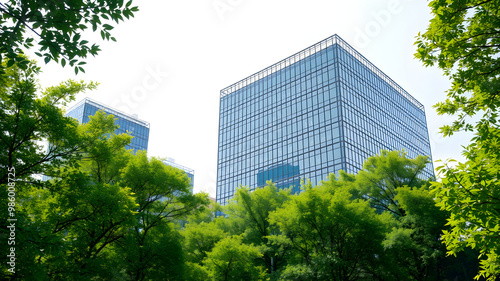 Modern Corporate Buildings Surrounded by Green Trees Emphasizing the Balance Between Nature and Business