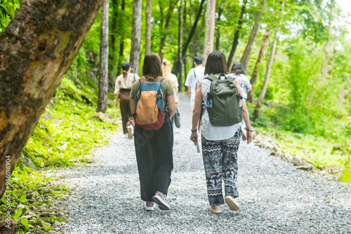 Billede på lærred Tourists walk through Thailand's Death Railway, built using forced labor during World War II, including Allied prisoners of war