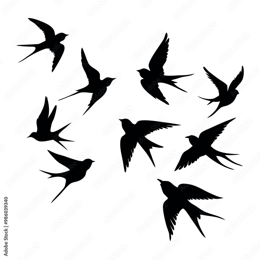 Fototapeta premium a group of nine birds flying in a random pattern. The birds are black and are silhouetted against a white background
