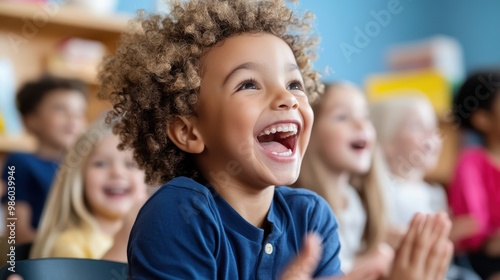 An exuberant child with curly hair laughs joyously in a classroom setting among fellow students, spreading joy and positive energy in a lively educational environment.