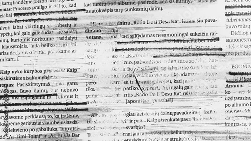 newspaper texture with strikethroughs and destruction