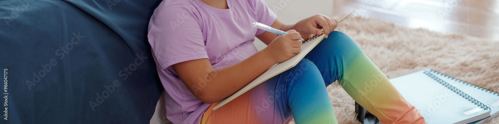Fototapeta premium Header with girl drawing in her free time