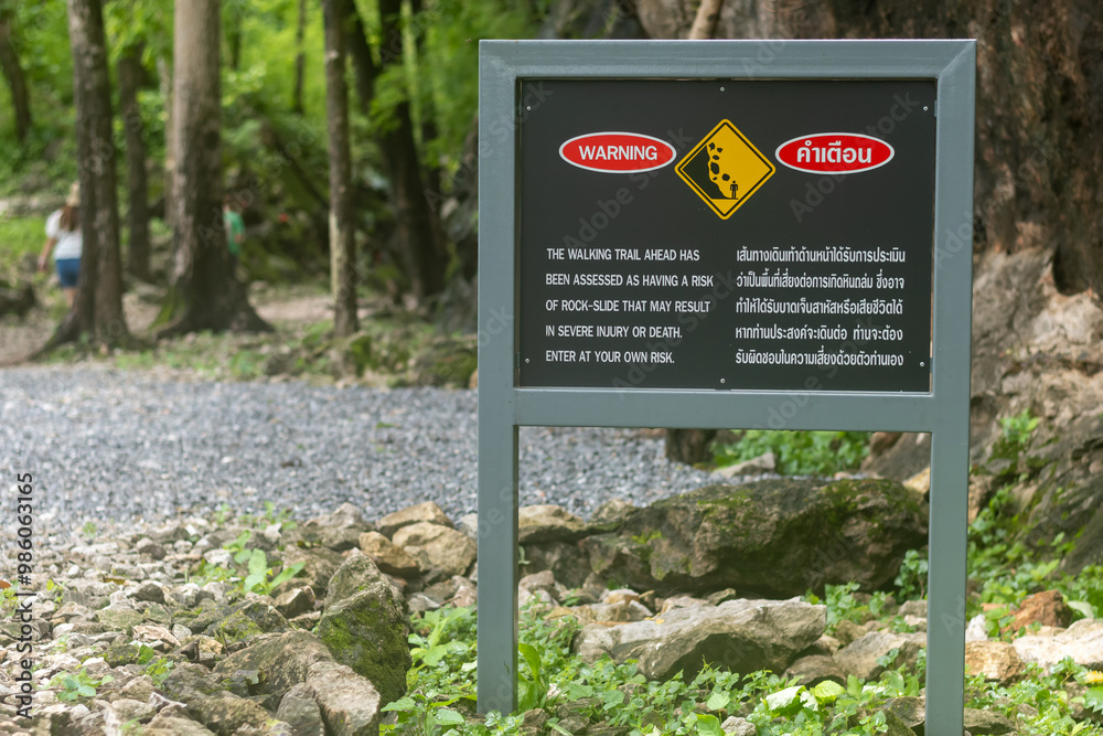 Kanchanaburi, Thailand Warning sign for falling rocks before entering ...