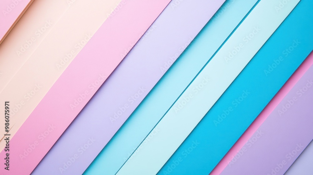 Fototapeta premium Diagonal pastel colored paper stripes.