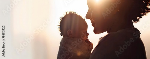 A newborn baby swaddled in a blanket, small hands visible close up, focus on, copy space, soft pinks and baby blues, Double exposure silhouette with a mother holding her child