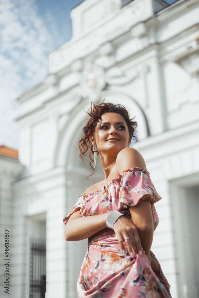 Beauty woman posing in the street in dress,beautiful brunette girl posing with red lips ,the wind in your hair sun street fashion clothing old building, fortress, glade, retro, vintage, jewelry Beauty woman posing in the street in dress,beautiful brunette girl posing with red lips ,the wind in your hair sun street fashion clothing old building, fortress, glade, retro, vintage, jewelry