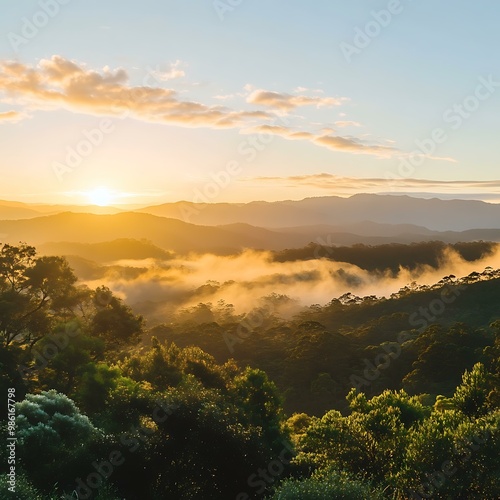 Golden Sunrise Over Foggy Mountain Landscape