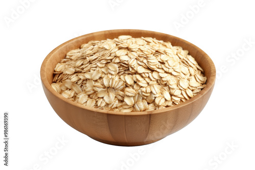 Organic rolled oats in bowl isolated on transparent background.