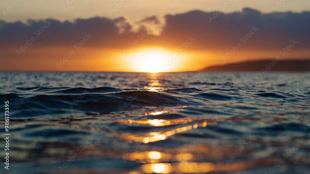 Blurred bokeh of a sunrise over a calm ocean