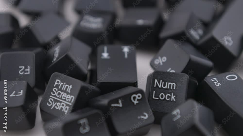 Black keyboard  keycaps rotates on white backgrond.