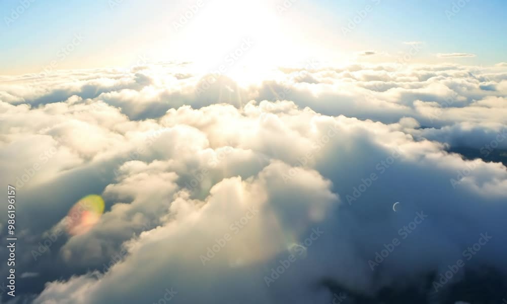 A bright blue sky filled with fluffy white cumulus clouds, creating a beautiful cloudscape that showcases the beauty of nature on a sunny day