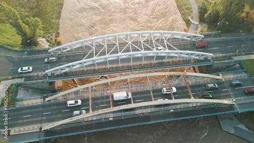 Cars driving over the Jagiellonskie Bridges in Wroclaw during the flood in Poland in September 2024 photo