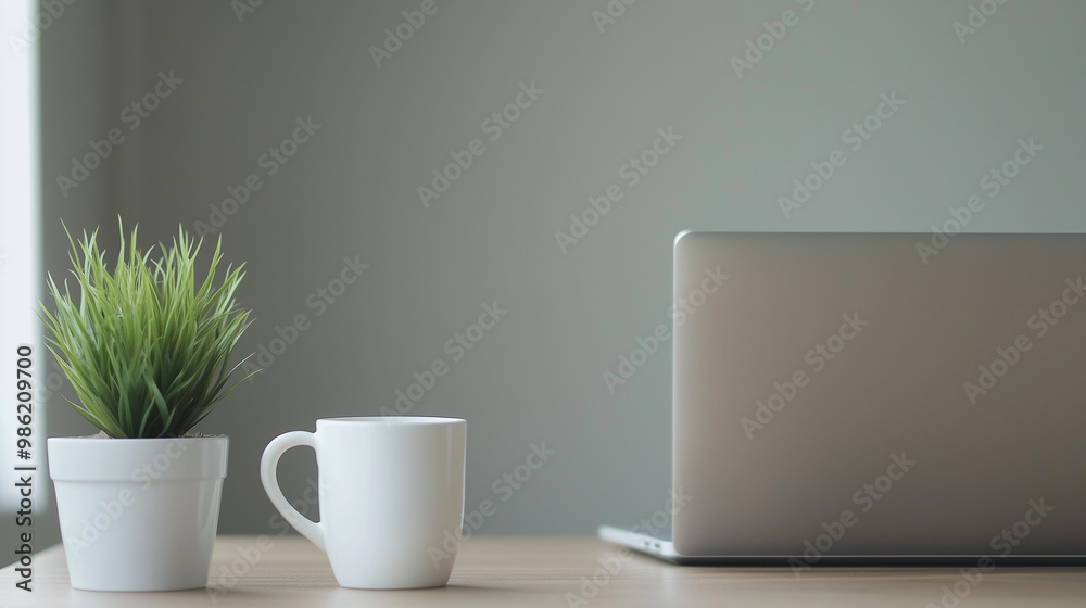 coffee cup and laptop coffee cup and laptop