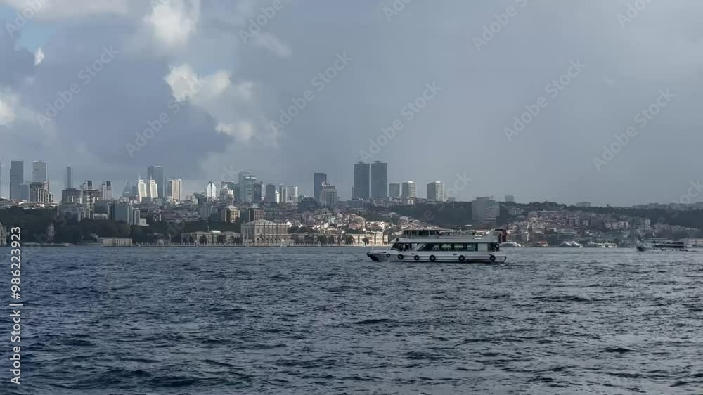 A ship sailing in the Bosphorus Strait A ship sailing in the Bosphorus Strait