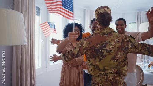 Cinematic video of a woman leaving for the military army service and greeting her father, mother and brother at home. photo