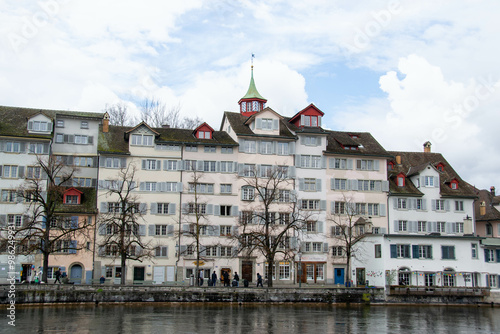 Scenic summer view of the Old Town architecture of Zurich with the bridge Untertorbryukke over Aare river, Zurich, Switzerland. High quality photo photo