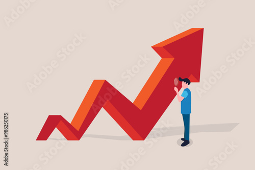 Businessman with magnifying glass looking for red arrow growing. concept of career growth, opportunity, and success