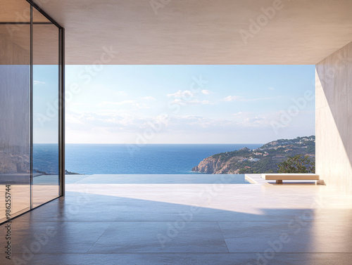 Modern coastal home interior overlooking the serene ocean view on a clear sunny day