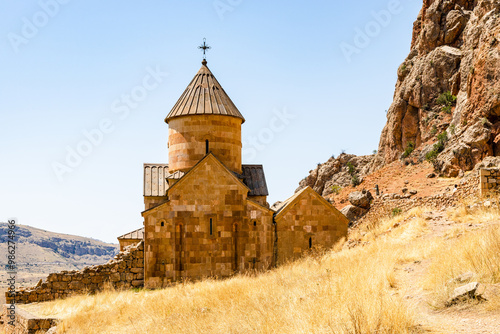 Surb Karapet church on mountain slope in Noravank