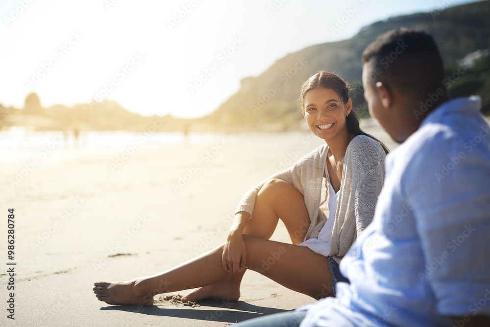 Couple, relax and talking on beach for travel, bonding and tropical holiday with sunshine, love and support. Man, woman and happy outdoor by ocean for vacation, trip and summer with romantic date