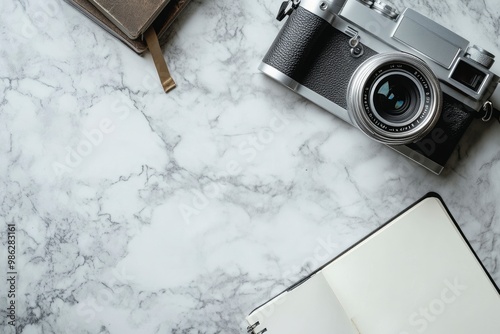 Workspace marble desk vintage camera, notebook and copy space. with generative ai