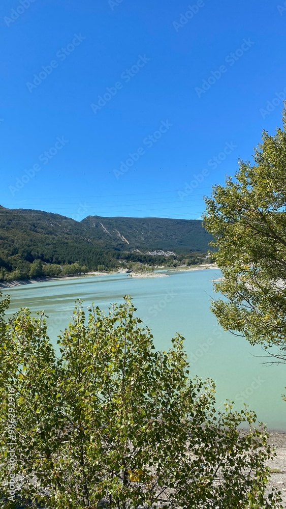 Embalse de Arguis: A Scenic Reservoir on the Isuela River in Huesca, Spain Embalse de Arguis: A Scenic Reservoir on the Isuela River in Huesca, Spain