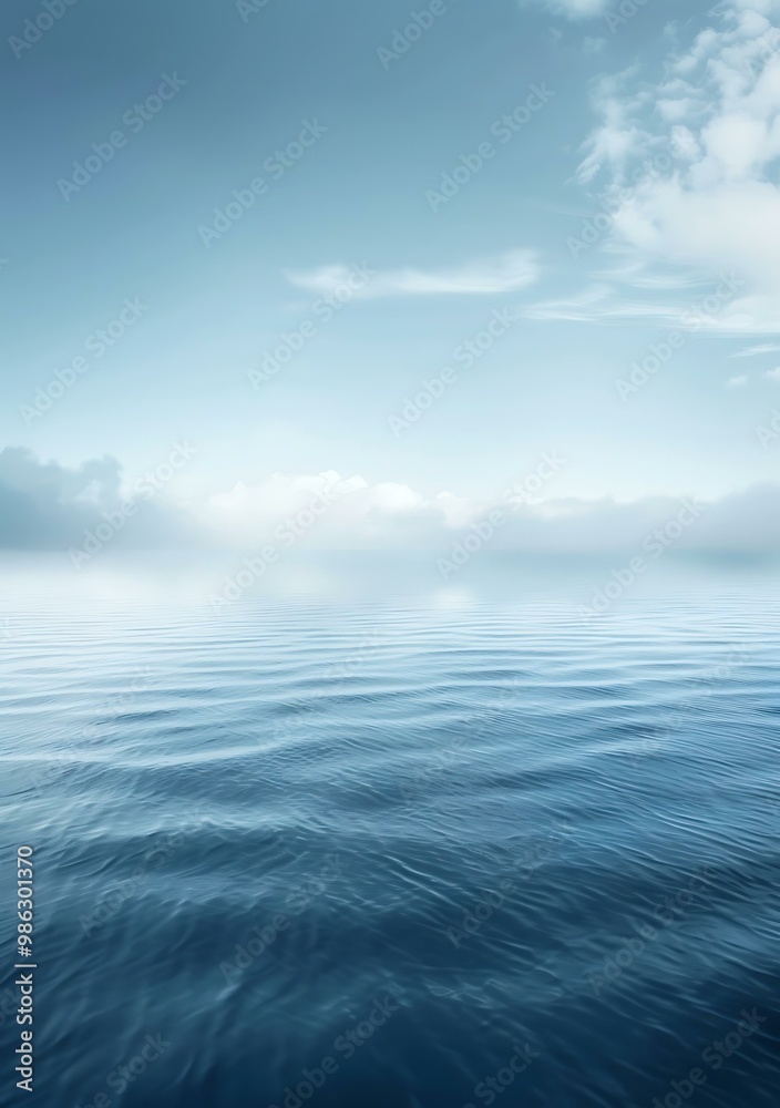 Obraz premium Blue Ocean Waves and White Clouds