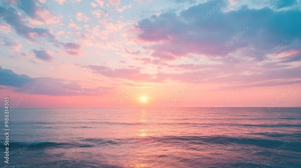 Vibrant sunset sky with a mix of soft orange, pink, and purple tones above a calm sea Vibrant sunset sky with a mix of soft orange, pink, and purple tones above a calm sea