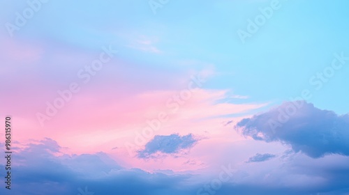 Pastel-toned sky at dusk, with soft colors blending from blue to pink