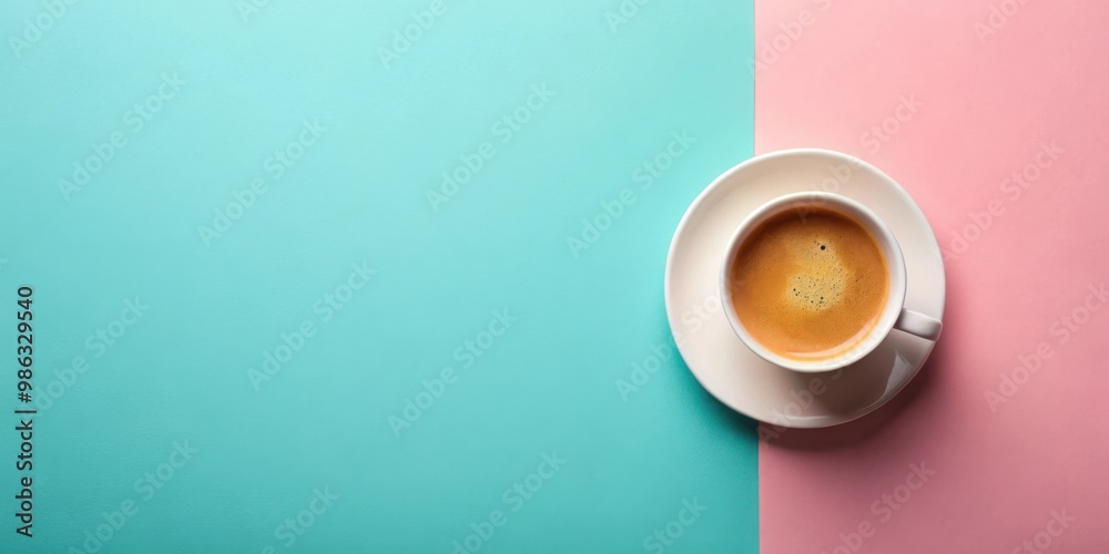 A top view of a coffee cup on a plain pastel background with space for text