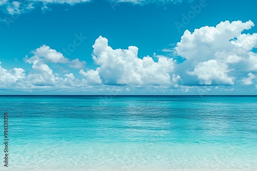 Blue Sky with White Clouds Above the Ocean