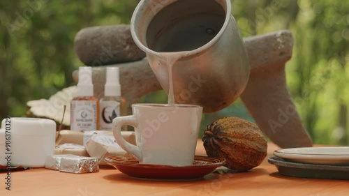 Hot chocolate served in a traditional cup from Central America.