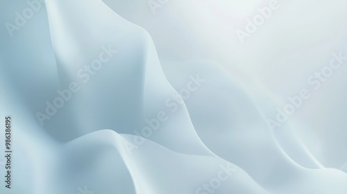 Soft blue waves are flowing gracefully creating a sense of elegance and serenity, perfect for various design projects that require a touch of sophistication