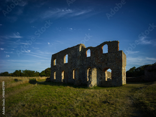 Schilderij op canvas Dunwich, Suffolk, UK - August 21st 2024 -  ruins of Dunwich Greyfriars Monastery