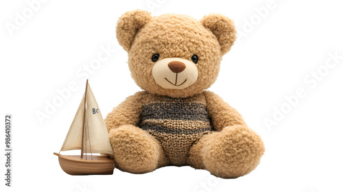 a teddy bear and a toy boat.