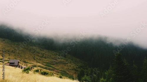 landscape polony in the fog, forest and mountains in the clouds, autumn colors, green and yellow tones, burnt grass, beauty of nature, poster, postcard, screen saver, wallpaper polony Yavirnyk, Carpat photo