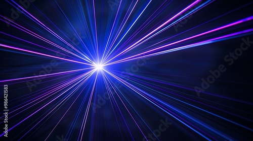 Blue and violet beams of bright laser light shining on black background