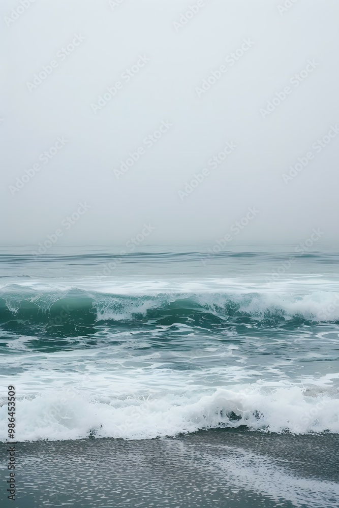 Fototapeta premium Ocean Waves Crashing on a Sandy Beach