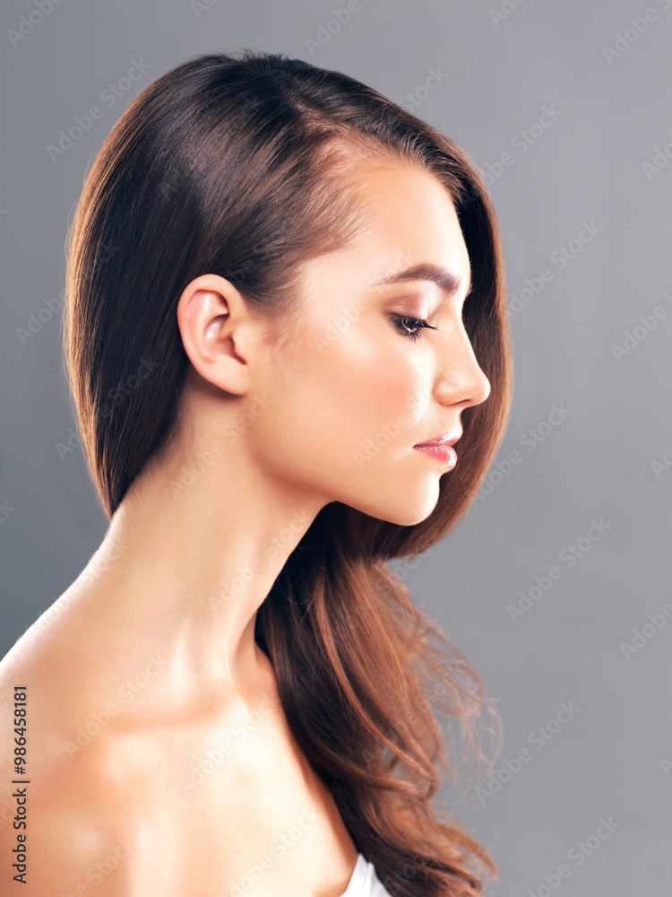 Beauty, hairstyle and shine with profile of woman in studio for glow, volume and hair gloss treatment. Scalp health, shampoo and growth with person on gray background for haircare, salon and keratin Beauty, hairstyle and shine with profile of woman in studio for glow, volume and hair gloss treatment. Scalp health, shampoo and growth with person on gray background for haircare, salon and keratin