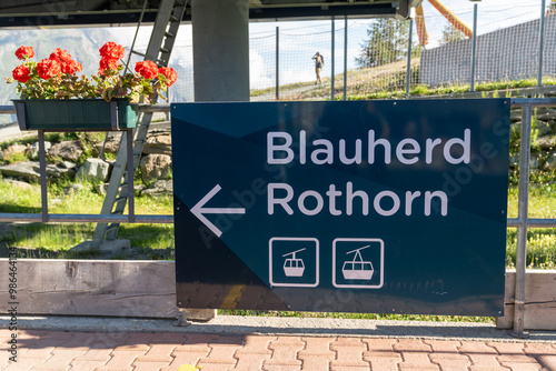 Sign for the cable car gondola to travel to Blauherd Rothorn in Zermatt Switzerland photo