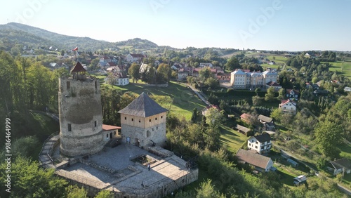 The picturesque and ancient castle is built on a hill with a magnificent view of the city of Czchów, Poland photo