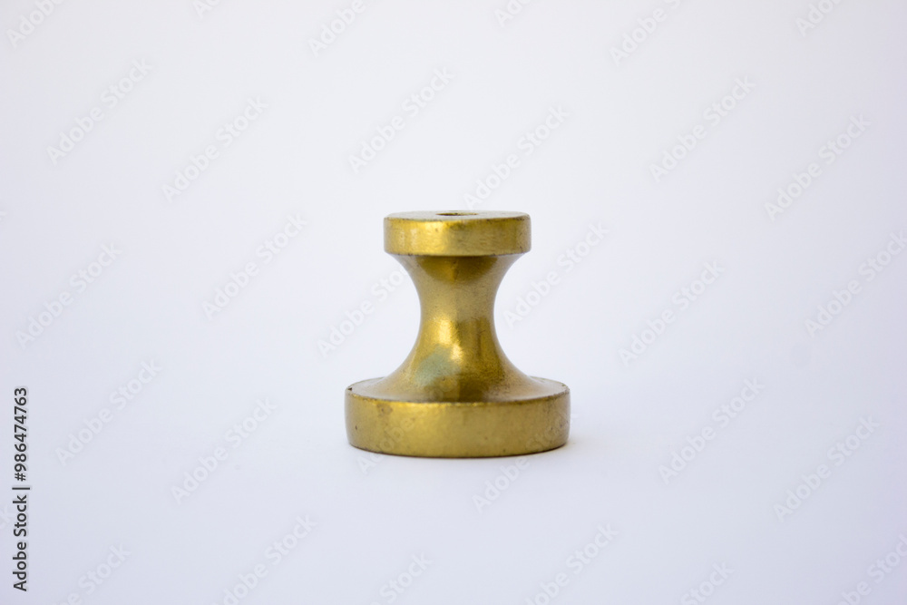 A picture of a gold-colored drawer handle. Drawer handles come in various forms, including knobs, pulls, and bail handles. A picture of a gold-colored drawer handle. Drawer handles come in various forms, including knobs, pulls, and bail handles.