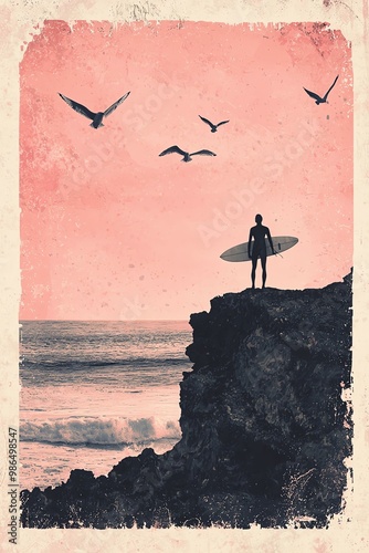 Vintage silhouette of a surfer holding a surfboard on a cliff, overlooking the ocean with birds flying against a pink sky backdrop. photo