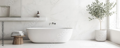 Large-format marble tiles with subtle veining in a minimalist bathroom, minimalist bathroom tiles, luxury and simplicity