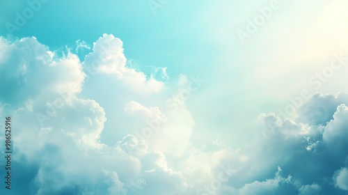 Dreamy sky background with light clouds and soft hues of blue