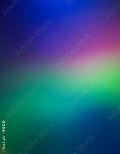 an abstract, blurred gradient of colors, primarily showcasing shades of blue, green, purple