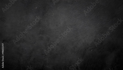 Black or dark gray rough grainy stone texture background 