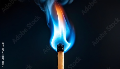 Vibrant Blue Flame Illuminating a Matchstick Against a Dark Backdrop